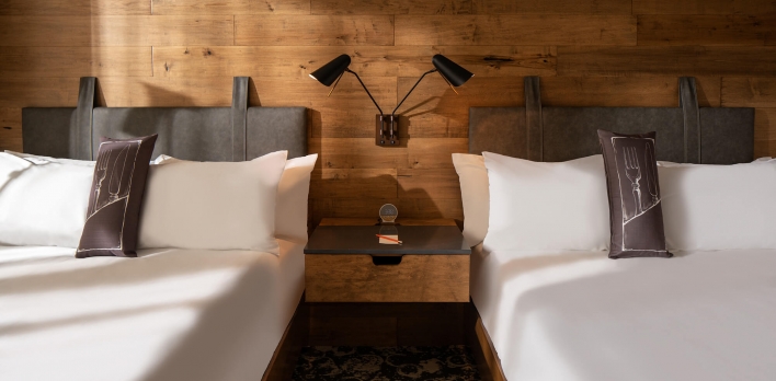 A Guest Room with two Queen beds with a city view