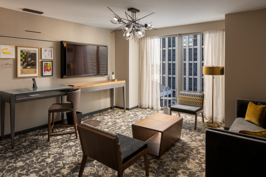 A room with a television and a table
