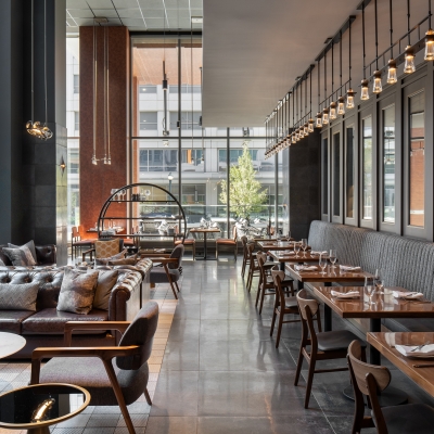 A restaurant with tables and chairs